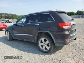 2011 Jeep Grand Cherokee Overland Summit with VIN 1J4RR6GT3BC686143, listed as a Copart auction lot 59218685 with 155,059 mi miles and Salvage title. Bid and sale history available at DreamBid. Image 2.