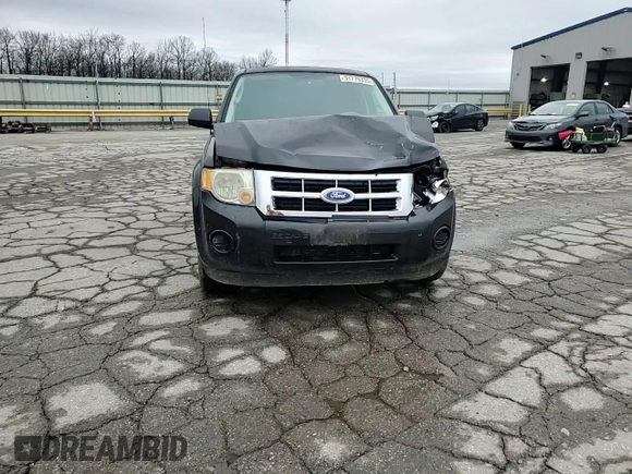 2011 Ford Escape XLS z VIN 1FMCU9C77BKC43662, wystawiony jako Copart lot #51779335 z przebiegiem 104 548 mil mil oraz Szkoda całkowita • Salvage title. Historia ofert i sprzedaży dostępna na DreamBid. Obrazek 12.