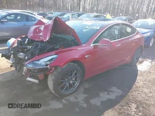 2018 Tesla Model 3 Long Range Battery with VIN 5YJ3E1EB4JF065581, listed as a IAAI auction lot 41542190 with 4,154 mi miles and . Bid and sale history available at DreamBid. Image 2.