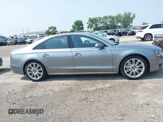 2013 Audi A8 4.0L with VIN WAUA2AFD5DN021950, listed as a IAAI auction lot 42472512 with 126,964 mi miles and . Bid and sale history available at DreamBid. Image 13.