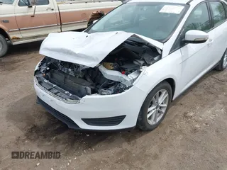 2016 Ford Focus SE with VIN 1FADP3F21GL403121, listed as a IAAI auction lot 42130743 with 103,592 mi miles and . Bid and sale history available at DreamBid. Image 6.