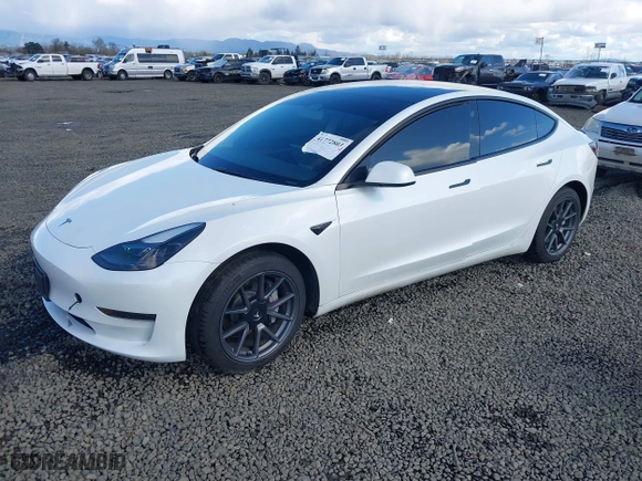 2023 Tesla Model 3 with VIN 5YJ3E1EA7PF570871, listed as a IAAI auction lot 41772803 with 1 mi miles. Bid and sale history available at carsss.com. Image 21.