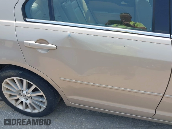 2006 Mercury Milan Premier with VIN 3MEFM081X6R616209, listed as a IAAI auction lot 42463805 with 154,675 mi miles and . Bid and sale history available at DreamBid. Image 17.