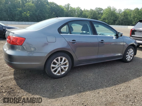 2014 Volkswagen Jetta SE z VIN 3VWD17AJ8EM405443, wystawiony jako Copart lot #59843445 z przebiegiem 156 331 mil mil oraz Szkoda całkowita • Salvage title. Historia ofert i sprzedaży dostępna na DreamBid. Obrazek 3.