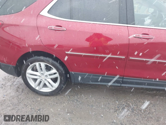 2018 Chevrolet Equinox Premier with VIN 2GNAXVEVXJ6115268, listed as a IAAI auction lot 40881577 with 61,910 mi miles and . Bid and sale history available at DreamBid. Image 20.