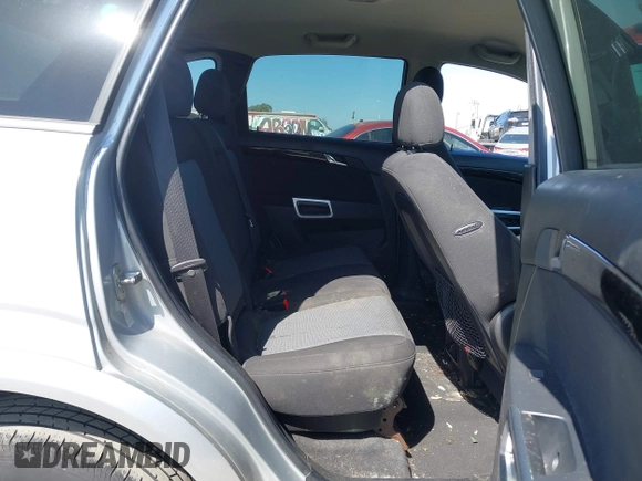 2013 Chevrolet Captiva Sport LT z VIN 3GNAL3EK5DS637043, wystawiony jako IAAI lot #42089008 z przebiegiem 170 556 mil mil oraz . Historia ofert i sprzedaży dostępna na DreamBid. Obrazek 8.