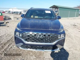2021 Hyundai Santa Fe Calligraphy z VIN 5NMS5DAL4MH352689, wystawiony jako IAAI lot #41740911 z przebiegiem 15 589 mil mil oraz . Historia ofert i sprzedaży dostępna na DreamBid. Obrazek 12.