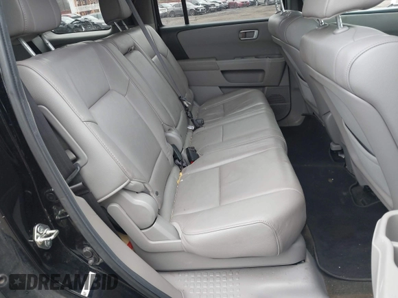 2013 Honda Pilot EX-L with VIN 5FNYF4H71DB021487, listed as a IAAI auction lot 41272308 with 188,217 mi miles and . Bid and sale history available at DreamBid. Image 8.