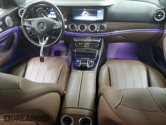 2017 Mercedes-Benz E 300 Luxury with VIN WDDZF4KB5HA054823, listed as a Copart auction lot 63022395 with 60,890 mi miles and Salvage title. Bid and sale history available at DreamBid. Image 8.