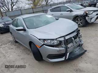 2017 Honda Civic LX z VIN 2HGFC2F51HH562496, wystawiony jako IAAI lot #41524243 z przebiegiem Nie podano mil oraz . Historia ofert i sprzedaży dostępna na DreamBid. Obrazek 1.