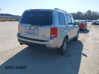 2011 Honda Pilot Touring with VIN 5FNYF4H96BB012122, listed as a IAAI auction lot 42071924 with 211,000 mi miles. Bid and sale history available at carsss.com. Image 4.