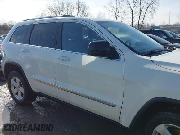 2012 Jeep Grand Cherokee Laredo with VIN 1C4RJFAG6CC279427, listed as a IAAI auction lot 41956034 with 86,689 mi miles. Bid and sale history available at carsss.com. Image 13.