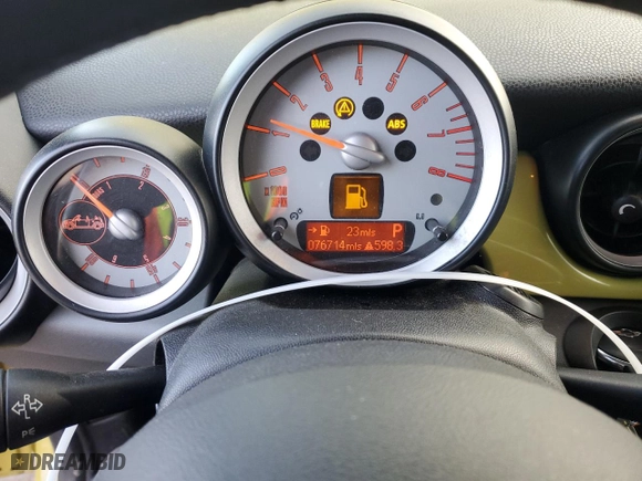 2009 MINI Cooper Convertible with VIN WMWMR33549TU95327, listed as a Copart auction lot 88493115 with 76,714 mi miles and Salvage Title. Bid and sale history available at carsss.com. Image 9.