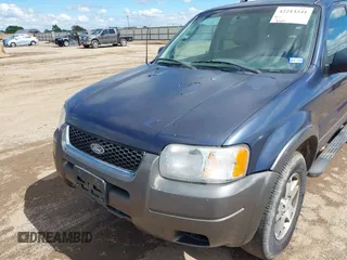 2004 Ford Escape XLT z VIN 1FMYU03144KA97818, wystawiony jako IAAI lot #42213241 z przebiegiem 183 280 mil mil oraz . Historia ofert i sprzedaży dostępna na DreamBid. Obrazek 6.