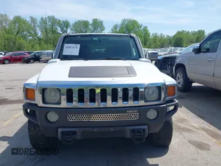 2006 Hummer H3 with VIN 5GTDN136168149867, listed as a IAAI auction lot 42057675 with 208,595 mi miles. Bid and sale history available at carsss.com. Image 6.