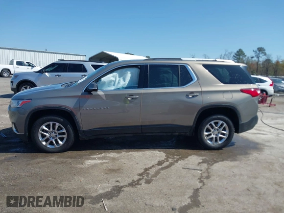 2018 Chevrolet Traverse LT Cloth z VIN 1GNEVGKW4JJ281837, wystawiony jako IAAI lot #41919081 z przebiegiem 91 496 mil mil oraz . Historia ofert i sprzedaży dostępna na DreamBid. Obrazek 14.