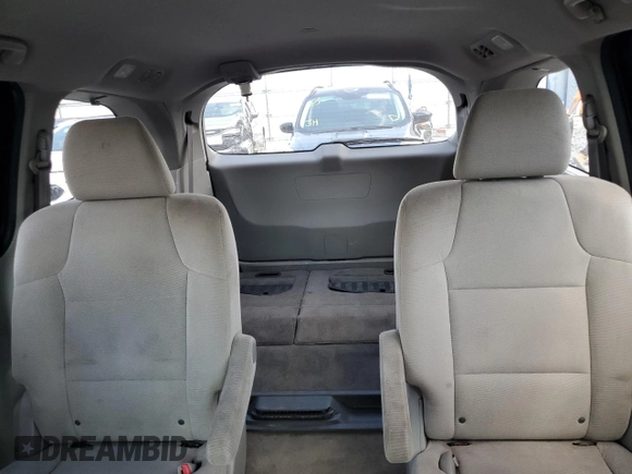 2011 Honda Odyssey LX z VIN 5FNRL5H23BB030230, wystawiony jako Copart lot #54798355 z przebiegiem 171 508 mil mil oraz Czysty tytuł • Clean title. Historia ofert i sprzedaży dostępna na DreamBid. Obrazek 10.
