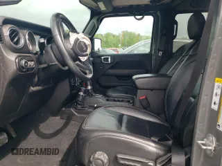 2018 Jeep Wrangler Unlimited Sahara z VIN 1C4HJXEN1JW248205, wystawiony jako Copart lot #54264885 z przebiegiem 103 201 mil mil oraz Szkoda całkowita • Salvage title. Historia ofert i sprzedaży dostępna na DreamBid. Obrazek 7.