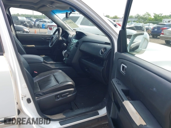 2011 Honda Pilot Touring z VIN 5FNYF4H9XBB003469, wystawiony jako IAAI lot #42369323 z przebiegiem 201 958 mil mil oraz . Historia ofert i sprzedaży dostępna na DreamBid. Obrazek 5.