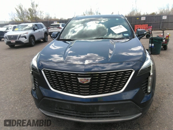 2021 Cadillac XT4 FWD Premium Luxury with VIN 1GYFZCR48MF004009, listed as a IAAI auction lot 41956723 with 82,483 mi miles. Bid and sale history available at carsss.com. Image 12.