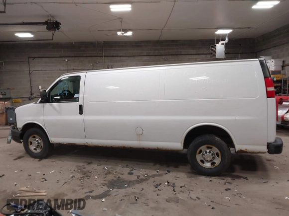 2012 Chevrolet Express Cargo Van with VIN 1GCWGGBA0C1100411, listed as a IAAI auction lot 41024219 with 197,251 mi miles. Bid and sale history available at carsss.com. Image 13.