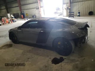 2009 Audi R8 4.2L z VIN WUAAU34279N002238, wystawiony jako Copart lot #74154804 z przebiegiem 71 425 mil mil oraz Szkoda całkowita • Salvage title. Historia ofert i sprzedaży dostępna na DreamBid. Obrazek 2.