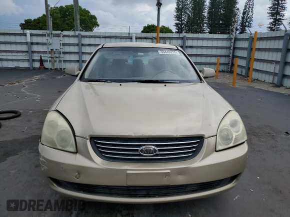 2008 Kia Optima LX z VIN KNAGE124385198719, wystawiony jako Copart lot #55449255 z przebiegiem 156 972 mil mil oraz Szkoda całkowita • Salvage title. Historia ofert i sprzedaży dostępna na DreamBid. Obrazek 5.