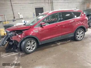2014 Ford Escape Titanium with VIN 1FMCU9JX3EUB92012, listed as a IAAI auction lot 41555457 with 137,303 mi miles. Bid and sale history available at carsss.com. Image 17.