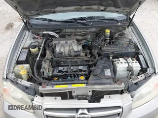 2002 Nissan Maxima GLE z VIN JN1DA31A12T000651, wystawiony jako IAAI lot #42167202 z przebiegiem Nie podano mil oraz . Historia ofert i sprzedaży dostępna na DreamBid. Obrazek 10.