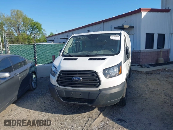 2018 Ford Transit with VIN 1FTYE1YM8JKB52082, listed as a IAAI auction lot 42098033 with 243,181 mi miles. Bid and sale history available at carsss.com. Image 12.