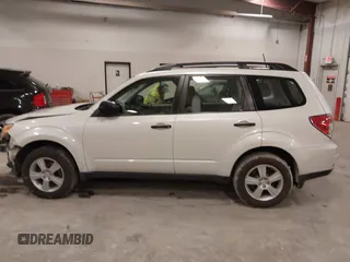 2012 Subaru Forester X with VIN JF2SHBBCXCH433191, listed as a IAAI auction lot 41964271 with 146,176 mi miles and . Bid and sale history available at DreamBid. Image 14.