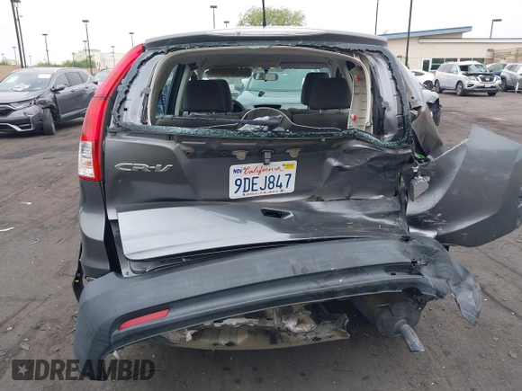 2014 Honda CR-V LX with VIN 2HKRM3H37EH522033, listed as a IAAI auction lot 42139386 with 156,214 mi miles. Bid and sale history available at carsss.com. Image 17.