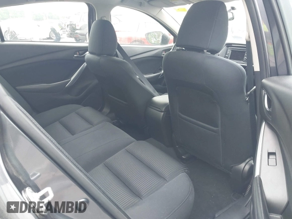 2014 Mazda 6 i Sport with VIN JM1GJ1U52E1102800, listed as a IAAI auction lot 42266283 with 103,886 mi miles and . Bid and sale history available at DreamBid. Image 8.