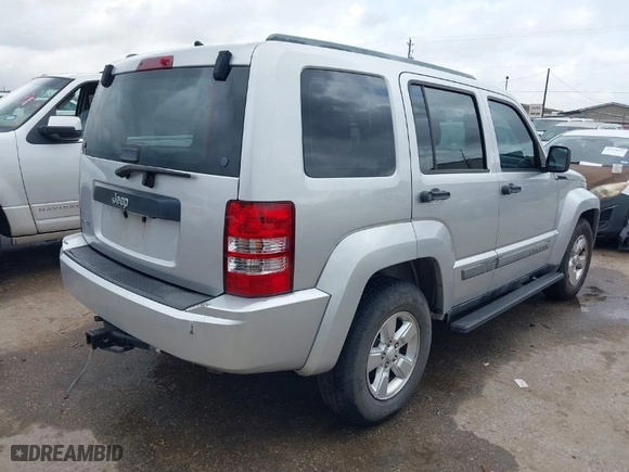 2011 Jeep Liberty Sport with VIN 1J4PN2GK6BW579234, listed as a IAAI auction lot 41118419 with 161,640 mi miles. Bid and sale history available at carsss.com. Image 4.