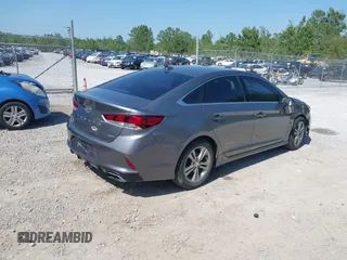 2018 Hyundai Sonata Sport with VIN 5NPE34AFXJH675527, listed as a IAAI auction lot 41996427 with 127,757 mi miles and . Bid and sale history available at carsss.com. Image 4.