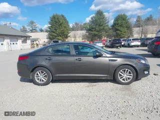 2012 Kia Optima LX with VIN 5XXGM4A72CG083861, listed as a IAAI auction lot 41909434 with 124,526 mi miles. Bid and sale history available at carsss.com. Image 13.