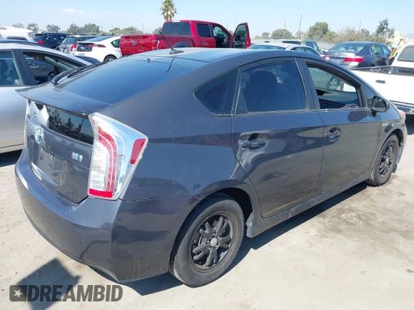 2015 Toyota Prius Four with VIN JTDKN3DU0F0431780, listed as a IAAI auction lot 40506614 with 102,670 mi miles. Bid and sale history available at carsss.com. Image 4.