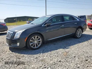 2014 Cadillac XTS Luxury z VIN 2G61M5S35E9216648, wystawiony jako Copart lot #52586955 z przebiegiem 124 753 mil mil oraz Szkoda całkowita • Salvage title. Historia ofert i sprzedaży dostępna na DreamBid. Obrazek 1.