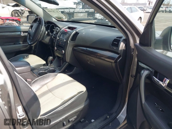 2013 Kia Sorento SX with VIN 5XYKWDA2XDG323728, listed as a IAAI auction lot 41781689 with 168,069 mi miles. Bid and sale history available at carsss.com. Image 5.