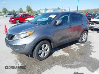 2013 Kia Sportage LX with VIN KNDPB3A24D7365157, listed as a IAAI auction lot 41968652 with 137,055 mi miles and . Bid and sale history available at DreamBid. Image 2.