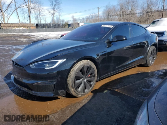 2023 Tesla Model S Plaid с VIN 5YJSA1E69PF515714, выставлен на аукционе Copart как лот 45212665 с пробегом Не указан миль и Списание • Salvage title. История ставок и продаж доступна на DreamBid. Изображение 1.