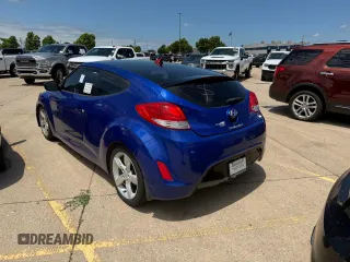 2013 Hyundai Veloster w/Black Int z VIN KMHTC6AD1DU094781, wystawiony jako Copart lot #60271115 z przebiegiem 122 541 mil mil oraz Szkoda całkowita • Salvage title. Historia ofert i sprzedaży dostępna na DreamBid. Obrazek 3.