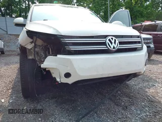 2014 Volkswagen Tiguan SEL with VIN WVGAV3AX7EW022239, listed as a IAAI auction lot 42381670 with 180,729 mi miles and . Bid and sale history available at DreamBid. Image 21.