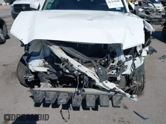2018 Toyota Tacoma SR5 with VIN 5TFAZ5CN4JX056465, listed as a IAAI auction lot 41767848 with 71,532 mi miles and . Bid and sale history available at DreamBid. Image 6.