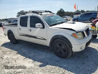 2007 Nissan Frontier SE with VIN 1N6AD09U97C464179, listed as a Copart auction lot 62142395 with 294,908 mi miles and Salvage title. Bid and sale history available at DreamBid. Image 4.