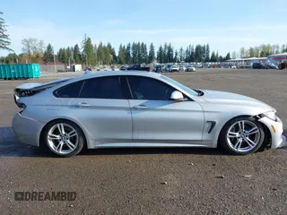 2016 BMW 4 Series 428i xDrive with VIN WBA4C9C5XGG135893, listed as a IAAI auction lot 41976541 with 86,987 mi miles and . Bid and sale history available at carsss.com. Image 14.