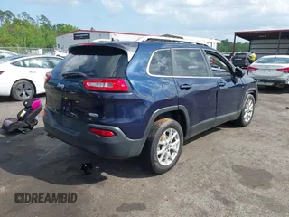 2015 Jeep Cherokee Latitude with VIN 1C4PJLCB5FW694359, listed as a IAAI auction lot 41934213 with 117,723 mi miles and . Bid and sale history available at DreamBid. Image 4.