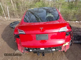 2021 Tesla Model Y Long Range with VIN 5YJYGDEE3MF212845, listed as a IAAI auction lot 41864260 with 43,451 mi miles. Bid and sale history available at carsss.com. Image 16.