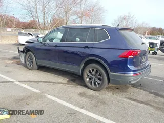 2023 Volkswagen Tiguan SE z VIN 3VVMB7AX3PM006867, wystawiony jako IAAI lot #40793976 z przebiegiem 29 648 mil mil oraz . Historia ofert i sprzedaży dostępna na DreamBid. Obrazek 3.