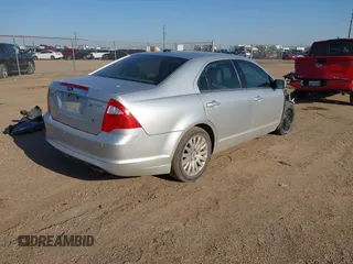 2012 Ford Fusion Hybrid with VIN 3FADP0L36CR289592, listed as a IAAI auction lot 41911406 with 174,977 mi miles and . Bid and sale history available at DreamBid. Image 4.